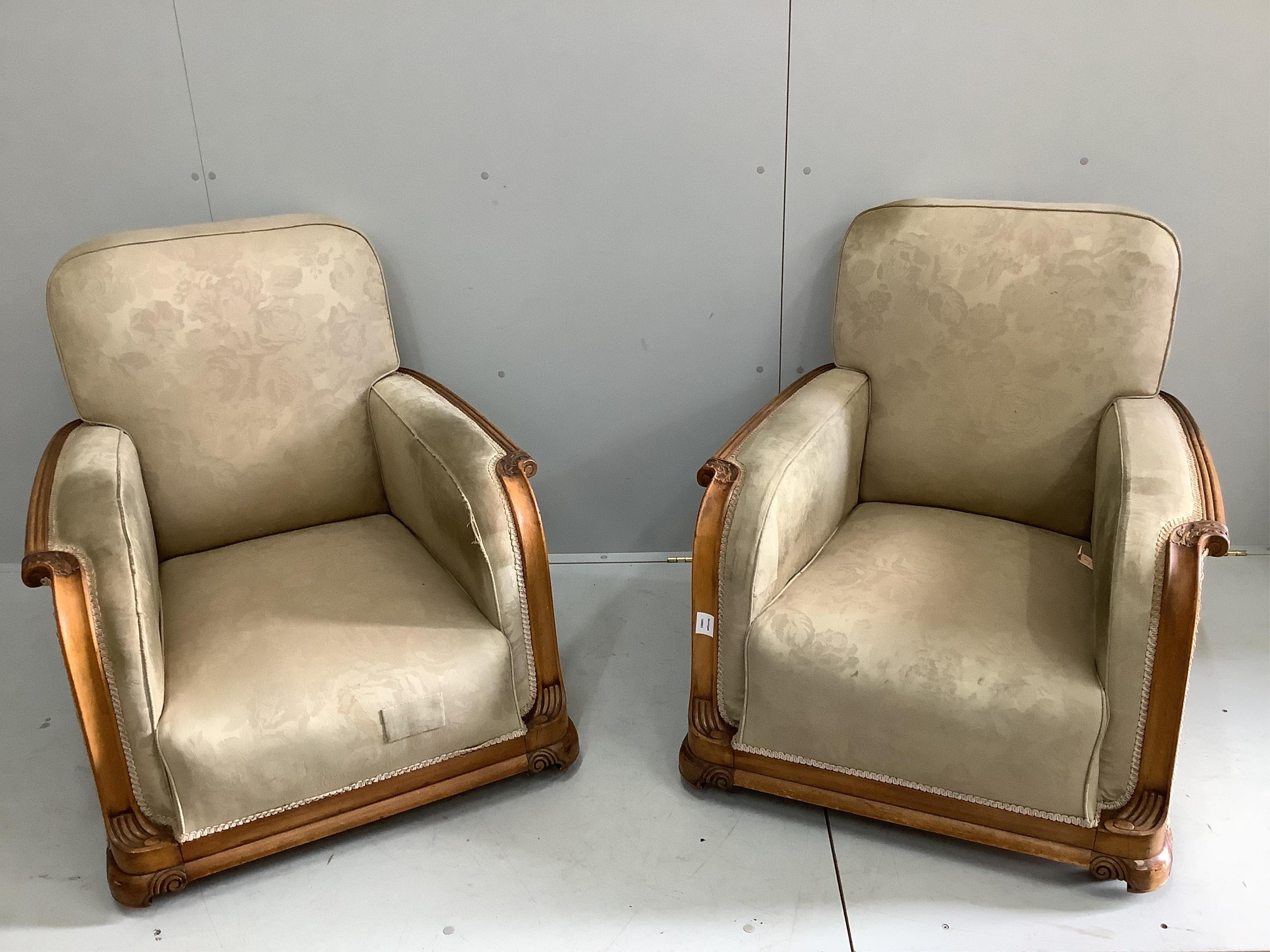 An Art Deco upholstered carved beech three piece suite, settee width 180cm, depth 80cm, height 82cm. Condition - fair, upholstery poor